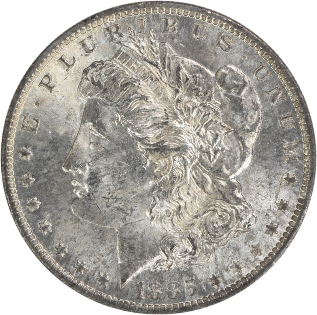 Uncirculated 1885-O Morgan Dollar Silver Coin Brilliant Uncertified: Uncirculated 1885-O Morgan Dollar Silver Coin Brilliant Uncertified This is an uncirculated 1885-O Morgan Silver Dollar from the United States. The coin features a Brilliant Uncirculated (BU) grade an