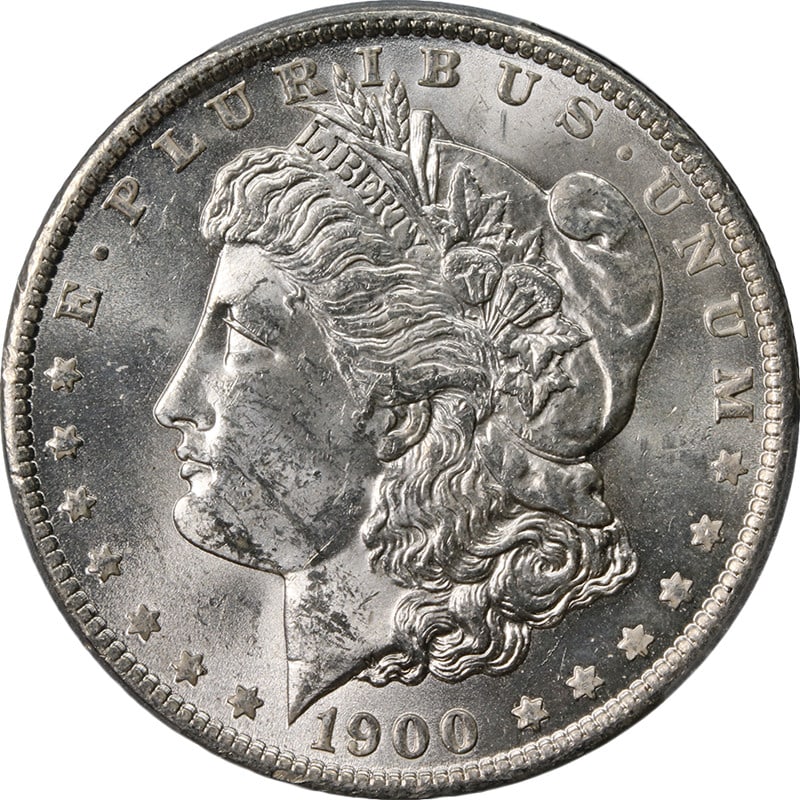 PCGS MS62 1900-O CC Morgan Dollar Blast White: PCGS MS62 1900-O CC Morgan Dollar Blast White This 1900-O/CC Morgan Silver Dollar is graded MS62 by PCGS and features outstanding luster, a strong strike, and impressive eye appeal. The coin displays 