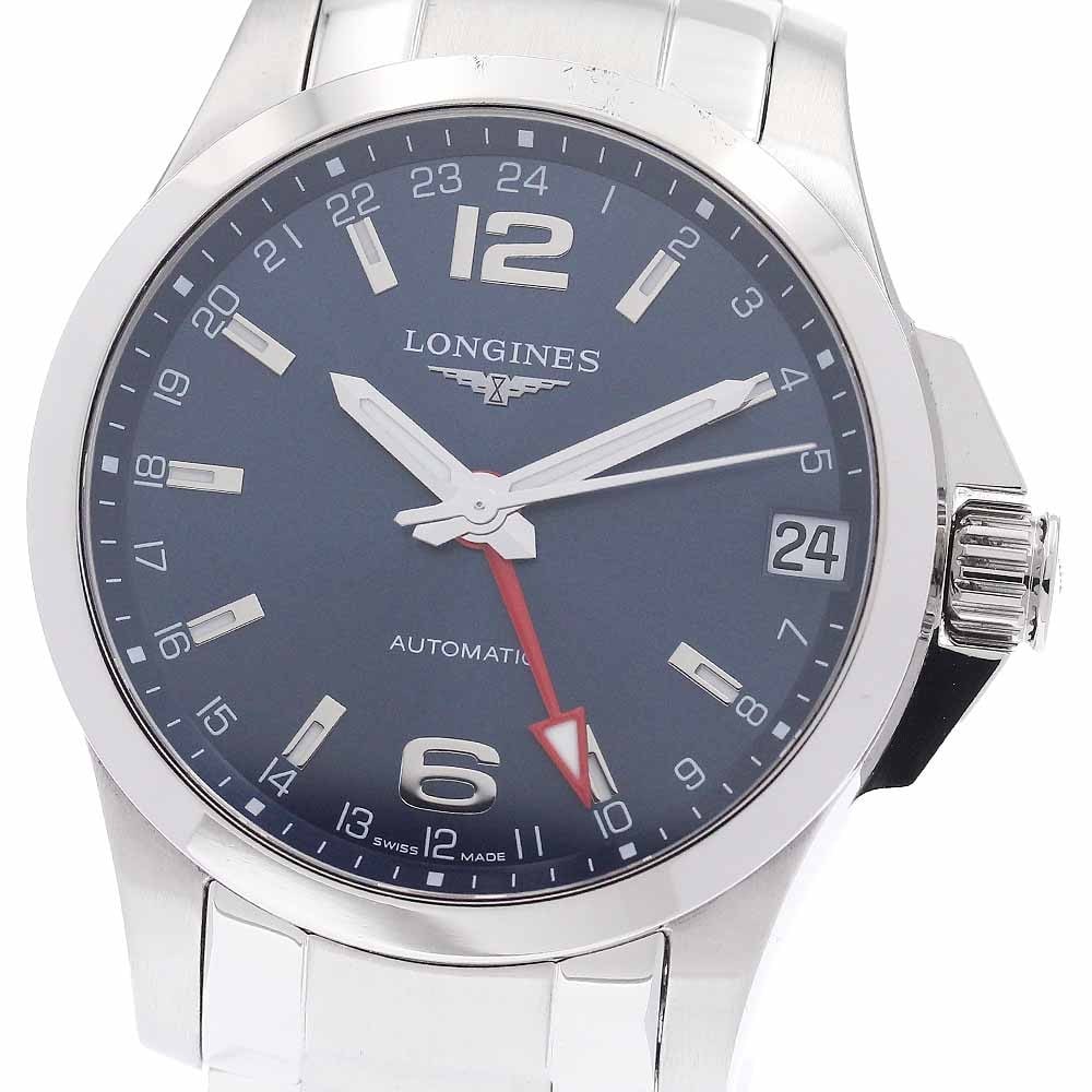 Longines Conquest GMT Date Automatic Mens Wristwatch L3.687.4: Longines Conquest GMT Date Automatic Mens Wristwatch L3.687.4 Pre-owned Longines Conquest GMT Date automatic men's wristwatch with a navy dial and stainless steel case and bracelet. It features date a