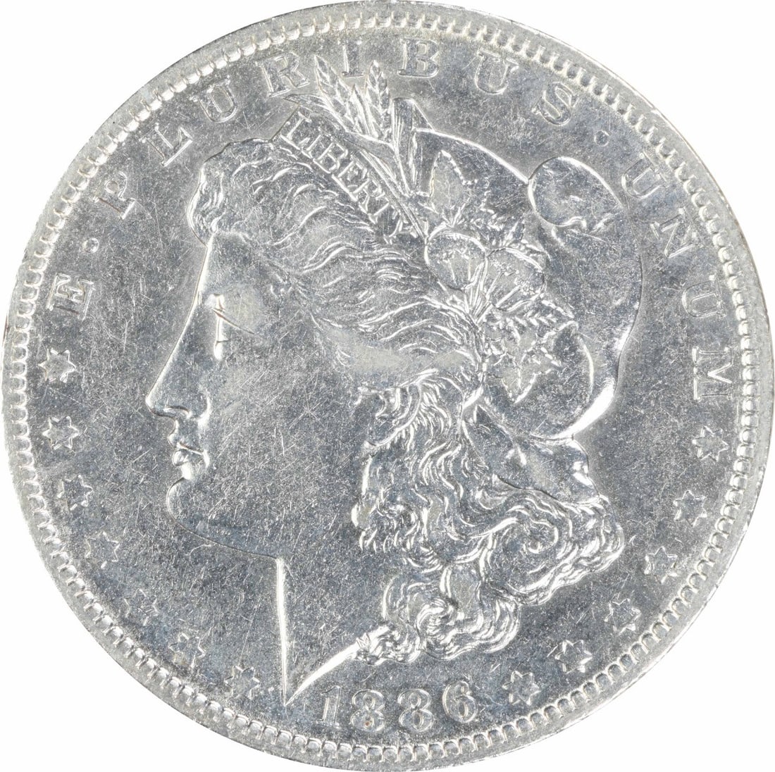 AU 1886 O Morgan Silver Dollar $1 Uncertified: AU 1886 O Morgan Silver Dollar $1 Uncertified 1886-O Morgan Silver Dollar in About Uncirculated (AU) grade. This pre-owned coin is an uncertified, circulated example struck in silver and issued in the