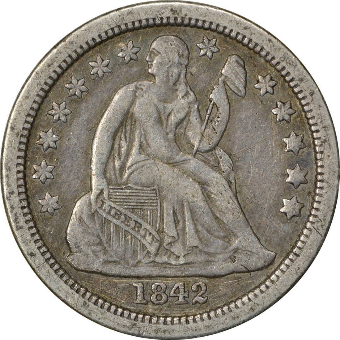 1842-O Liberty Seated Dime 90% Silver XF Uncertified: 1842-O Liberty Seated Dime 90% Silver XF Uncertified This 1842-O Liberty Seated Silver Dime showcases a rich history with its classic design by Christian Gobrecht. Struck at the New Orleans Mint, this