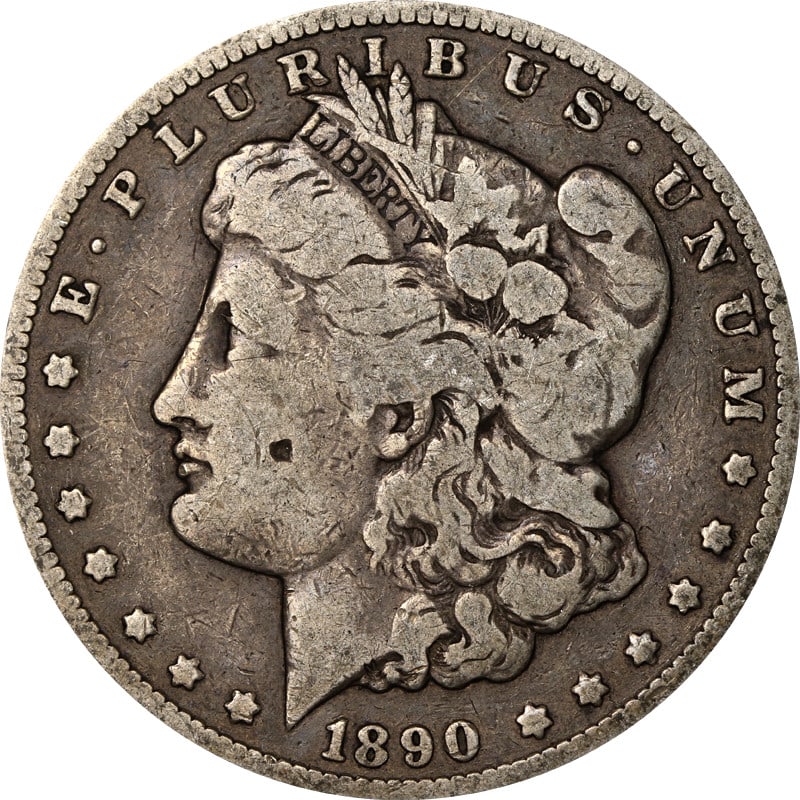 United States 1890 CC Morgan Silver Dollar Coin: United States 1890 CC Morgan Silver Dollar Coin 1890-CC Morgan Silver Dollar coin in pre-owned, circulated condition. This uncertified United States silver coin is identified as a Morgan Silver Dollar