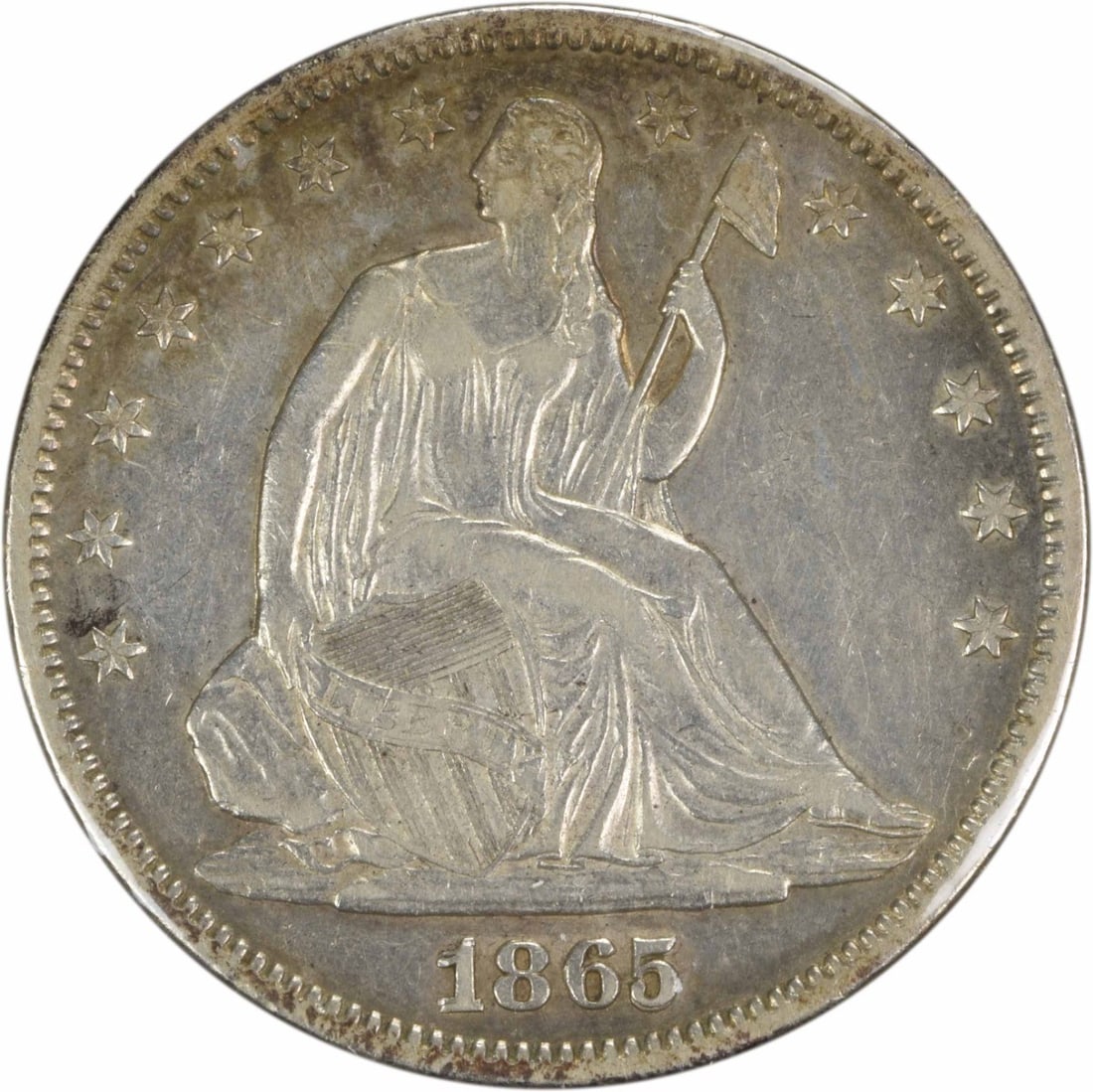 1865 Seated Liberty 50C Half Dollar FS-301 RPD EF Uncertified: 1865 Seated Liberty 50C Half Dollar FS-301 RPD EF Uncertified An 1865 Liberty Seated Half Dollar, identified as RPD FS-301, in Choice EF grade. The coin is circulated, uncertified, and pre-owned, with