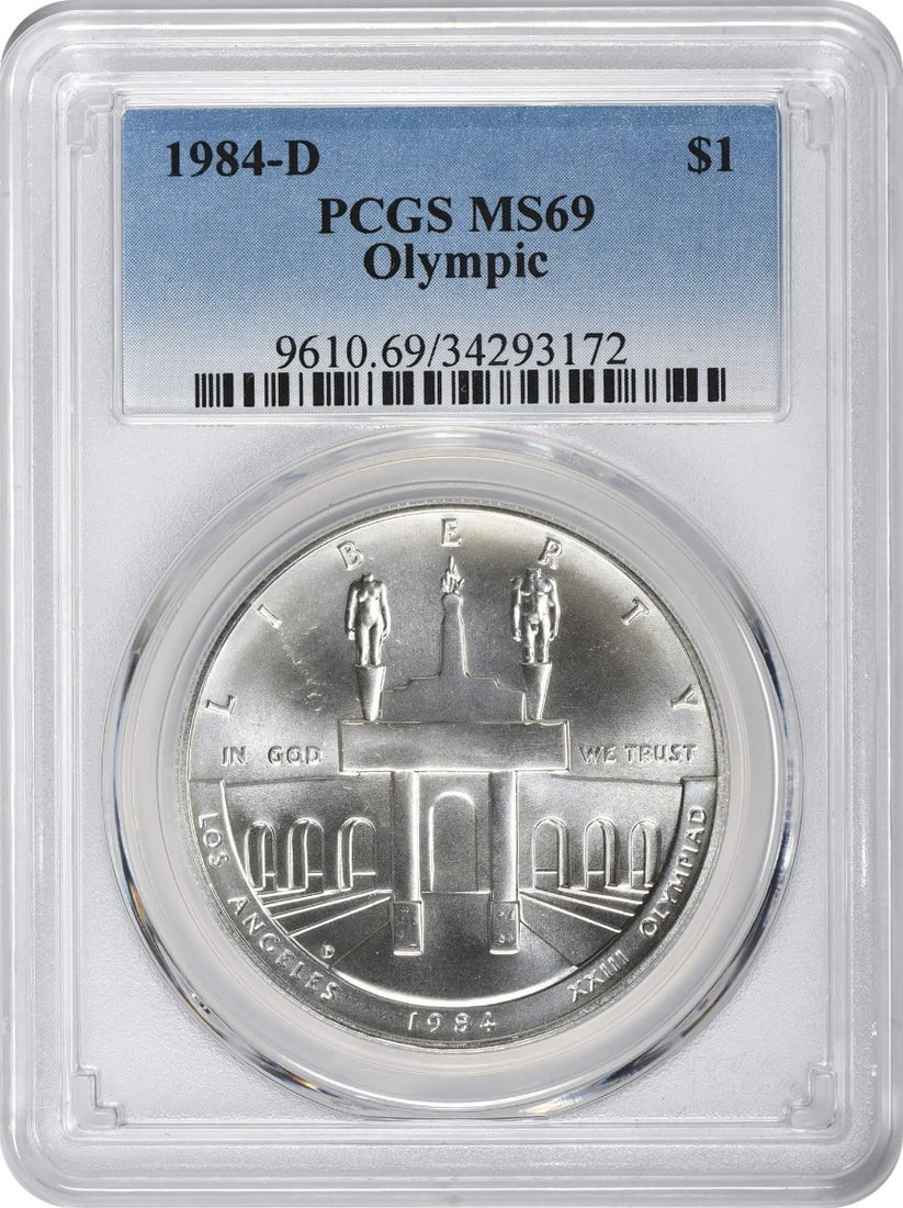 PCGS MS69 1984-D Olympic Silver Commemorative Dollar Coin: PCGS MS69 1984-D Olympic Silver Commemorative Dollar Coin This is a 1984-D Olympic Silver Commemorative Dollar graded MS69 by PCGS. Minted in Denver, this uncirculated coin is composed of 90% silver a