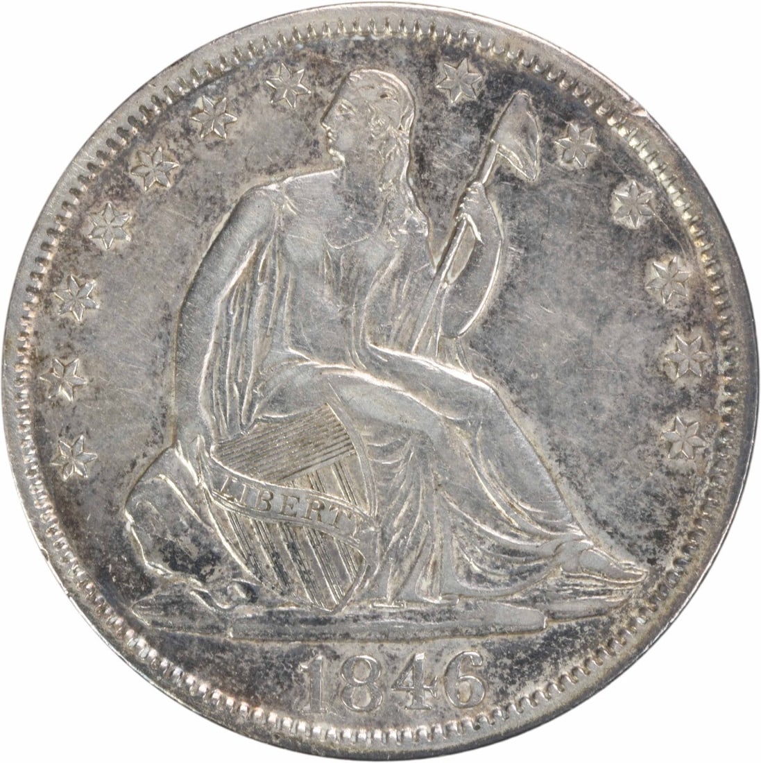 1846 Liberty Seated Half Dollar 50C Silver Circulated: 1846 Liberty Seated Half Dollar 50C Silver Circulated This 1846 Liberty Seated Half Dollar features a tall date and is graded as EF (Extremely Fine). Minted in Philadelphia, this coin showcases the in