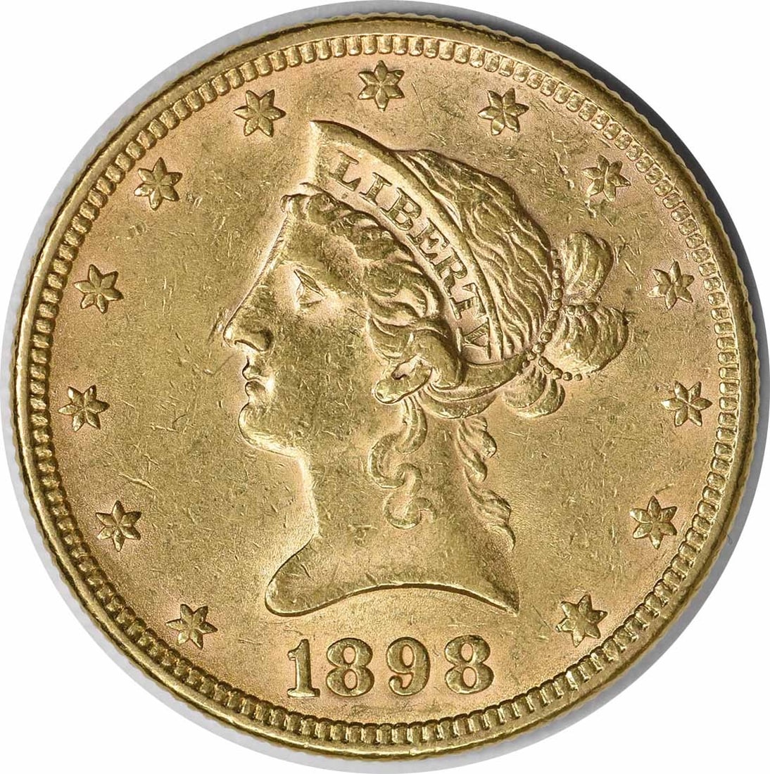1898 $10 Gold Liberty Head Coin AU Uncertified Philadelphia Mint: 1898 $10 Gold Liberty Head Coin AU Uncertified Philadelphia Mint This 1898 $10 Gold Liberty Head coin features a design by Christian Gobrecht and is a remarkable piece from the Pre-1933 era. Struck in