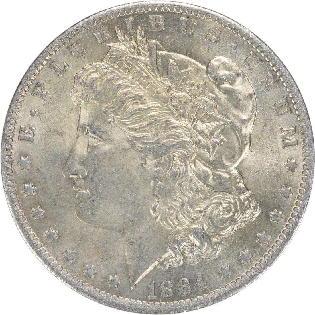 Uncirculated 1884-O Silver Dollar Morgan Type Brilliant Condition: Uncirculated 1884-O Silver Dollar Morgan Type Brilliant Condition This is an 1884-O Morgan Silver Dollar, featuring uncirculated condition and brilliant uncirculated (BU) grade. The coin is composed o
