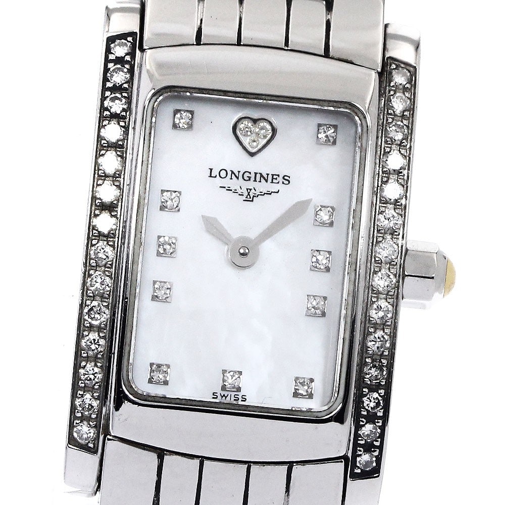 Longines Dolce Vita quartz women's stainless steel wristwatch: Longines Dolce Vita quartz women's stainless steel wristwatch This Longines Dolce Vita women's wristwatch features a stainless steel case and band, with side diamonds adding an elegant touch. The watc