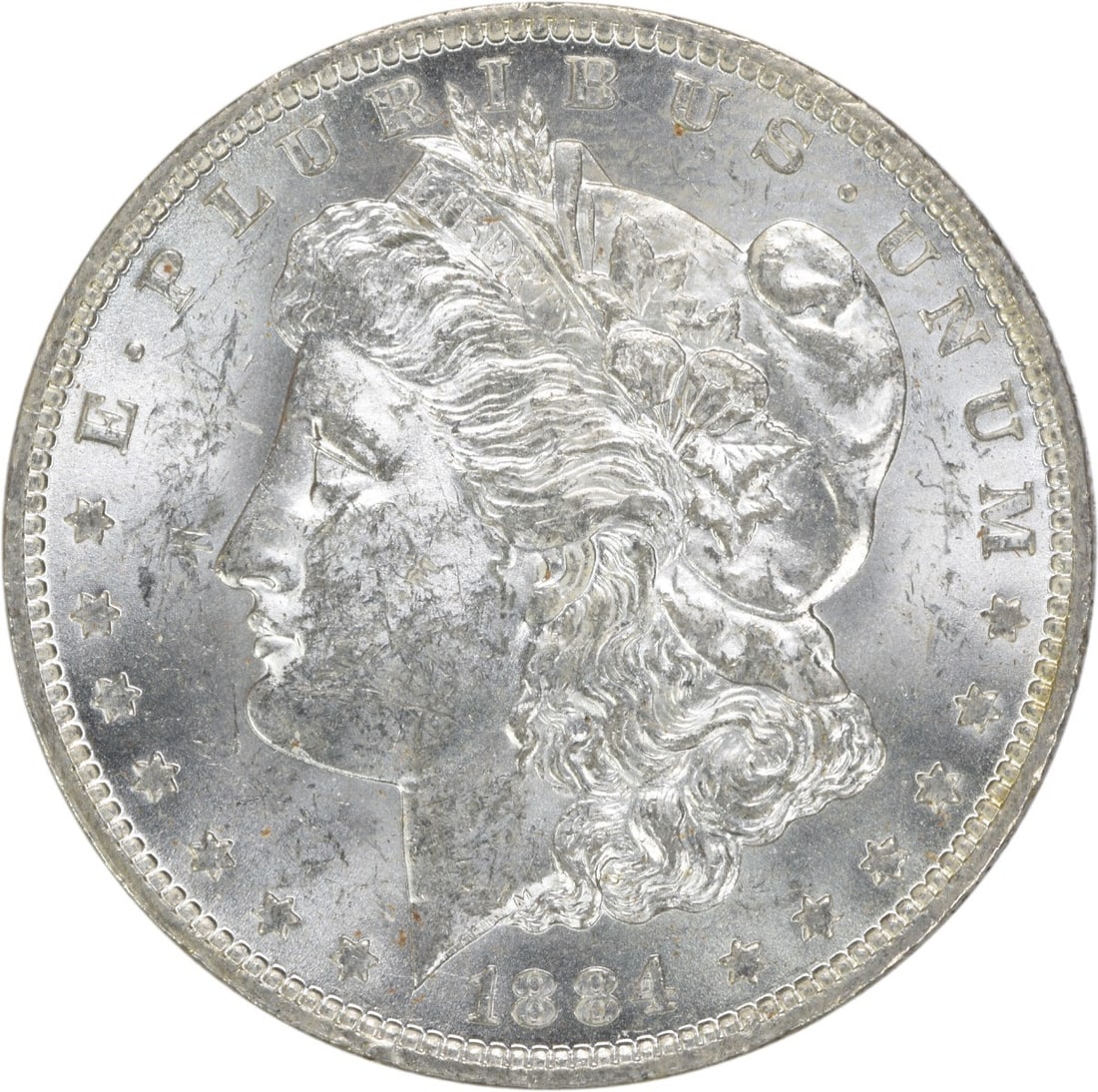 Uncirculated 1884 O Morgan Dollar Silver Coin Brilliant BU Uncertified: Uncirculated 1884 O Morgan Dollar Silver Coin Brilliant BU Uncertified This is an 1884-O Morgan Silver Dollar from the United States. The coin is uncirculated and has not been certified. It is made of