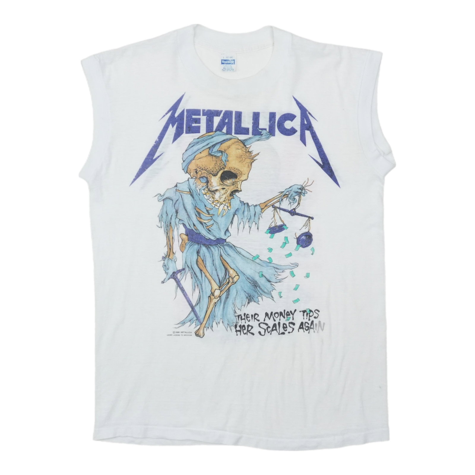 Metallica Doris 1988 vintage sleeveless cotton shirt white large: Metallica Doris 1988 vintage sleeveless cotton shirt white large Original vintage 1988 Metallica Doris sleeveless shirt in white. This is a true vintage shirt, not a modern reproduction. It is in good