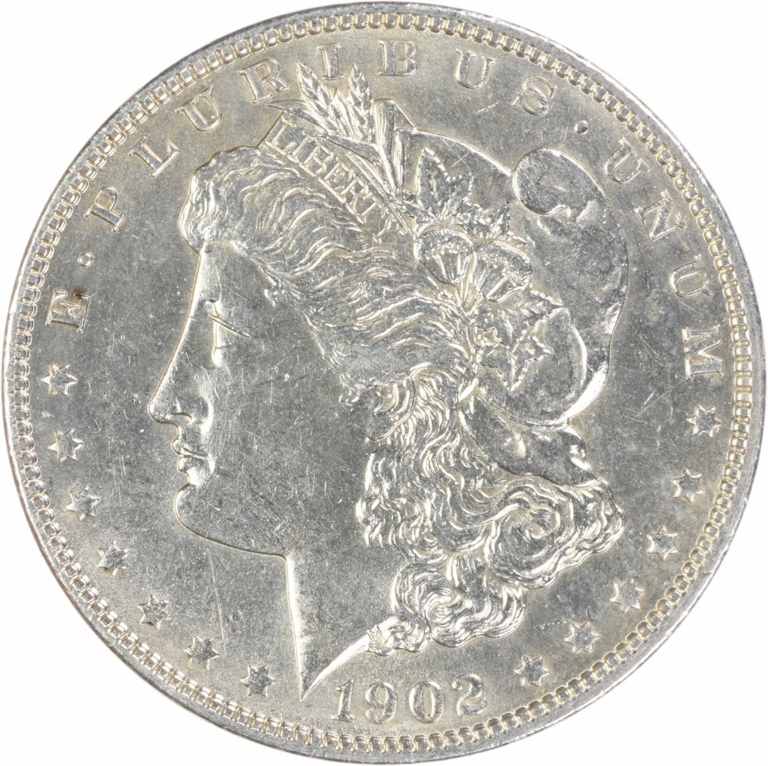 1902 Philadelphia Morgan Dollar AU Uncertified Silver $1 Coin: 1902 Philadelphia Morgan Dollar AU Uncertified Silver $1 Coin 1902 Morgan Silver Dollar in AU grade, uncertified and circulated. This United States coin features the Morgan design by George T. Morgan 