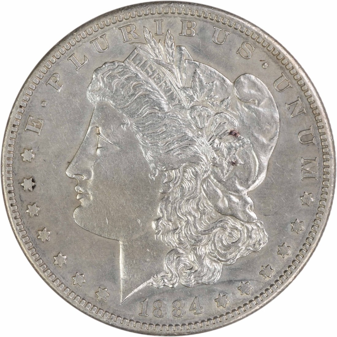 AU Grade 1884 San Francisco Morgan Dollar Uncertified 90 Percent Silver: AU Grade 1884 San Francisco Morgan Dollar Uncertified 90 Percent Silver This 1884-S Morgan Silver Dollar is an AU grade, circulated coin minted in San Francisco. Designed by George T. Morgan, it is co