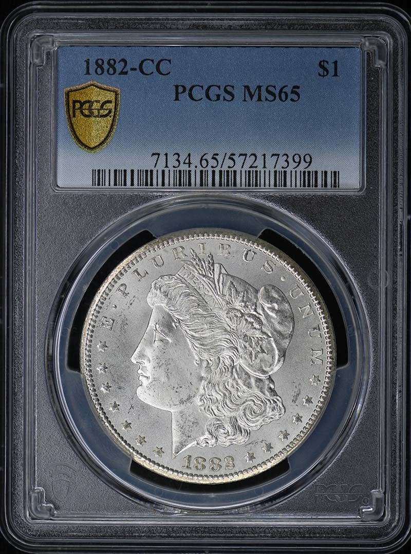 PCGS MS65 1882 Carson City Morgan Silver Dollar $1: PCGS MS65 1882 Carson City Morgan Silver Dollar $1 1882-CC Morgan Dollar certified by PCGS and graded MS65. This uncirculated United States silver dollar is a pre-owned collectible from the Carson Cit