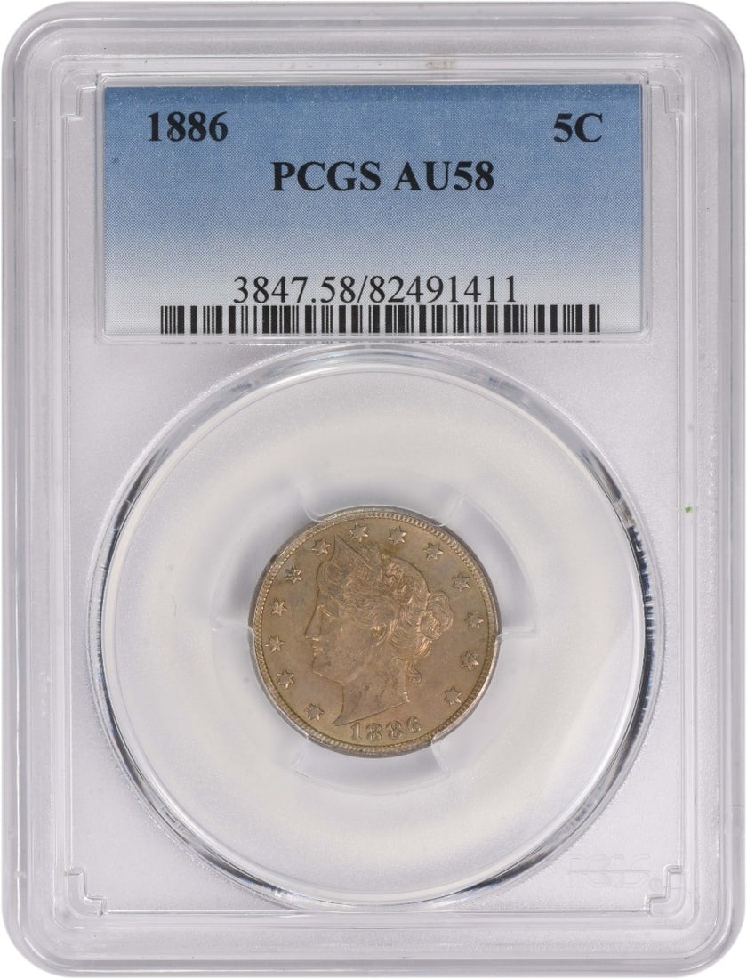 PCGS AU58 1886 Liberty Five Cent Philadelphia Coin: PCGS AU58 1886 Liberty Five Cent Philadelphia Coin This 1886 Liberty Nickel is graded AU58 by PCGS and was minted in Philadelphia. Designed by Charles E. Barber, the coin is composed of 75% copper and