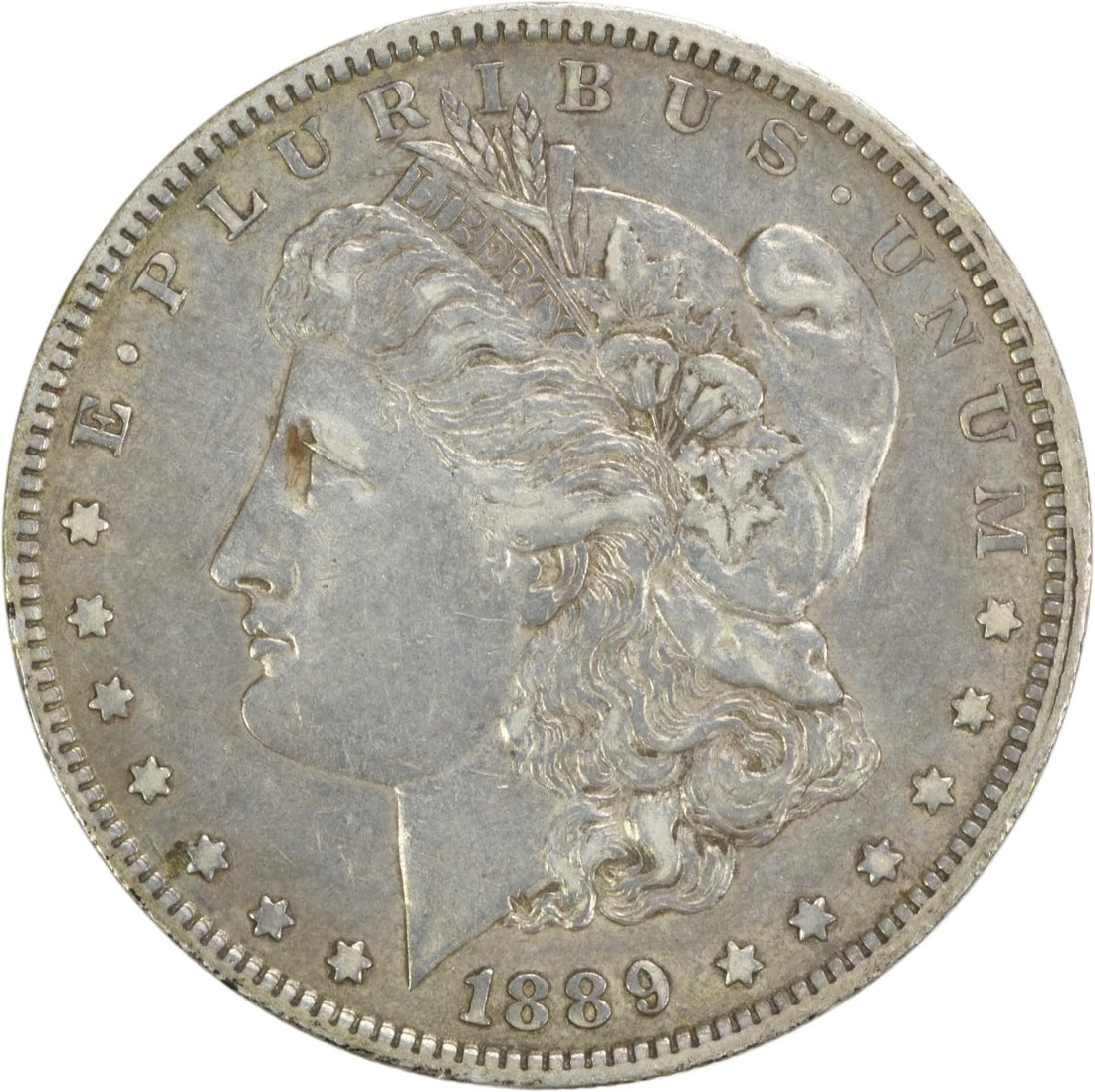 1889-O Morgan Silver Dollar Uncertified 90% Silver Coin: 1889-O Morgan Silver Dollar Uncertified 90% Silver Coin This 1889-O Morgan Silver Dollar is a stunning example of American coinage, featuring a beautiful design by George T. Morgan. The coin is circul