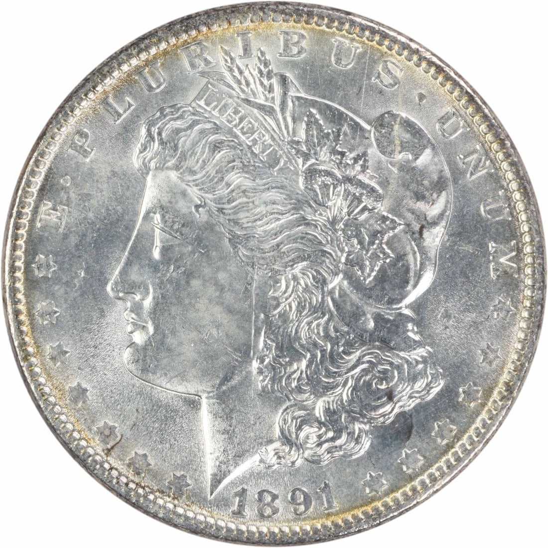 1891 Uncirculated Morgan Silver Dollar $1 Uncertified: 1891 Uncirculated Morgan Silver Dollar $1 Uncertified 1891 Morgan Silver Dollar in uncirculated condition and uncertified. This United States coin has a $1 denomination and features the Morgan design 