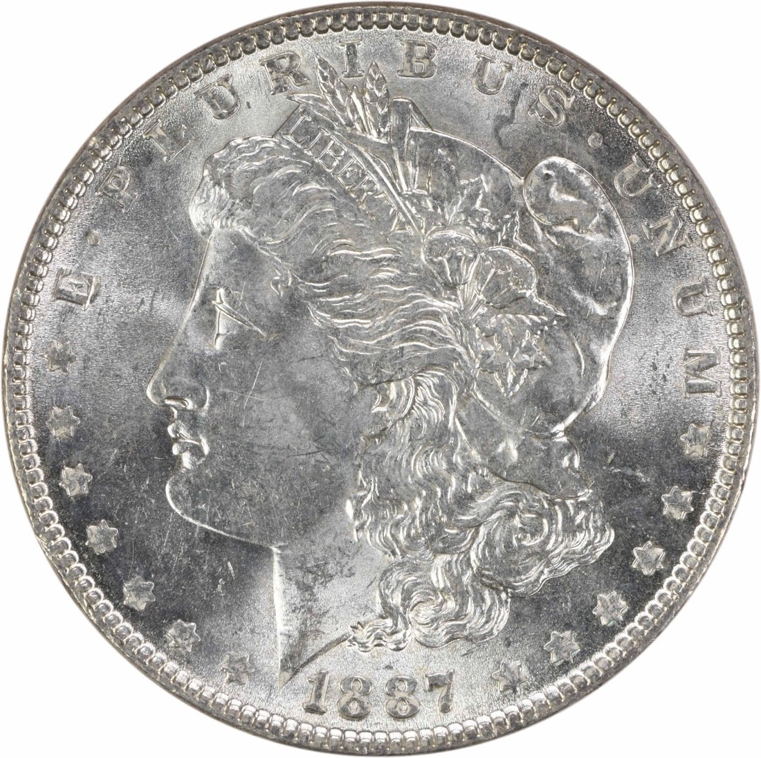 Choice Uncirculated 1887 Silver Dollar Morgan Type Uncertified: Choice Uncirculated 1887 Silver Dollar Morgan Type Uncertified This 1887 Morgan Silver Dollar is a Choice Brilliant Uncirculated (BU) coin. It is uncertified and features no mint mark, indicating it w