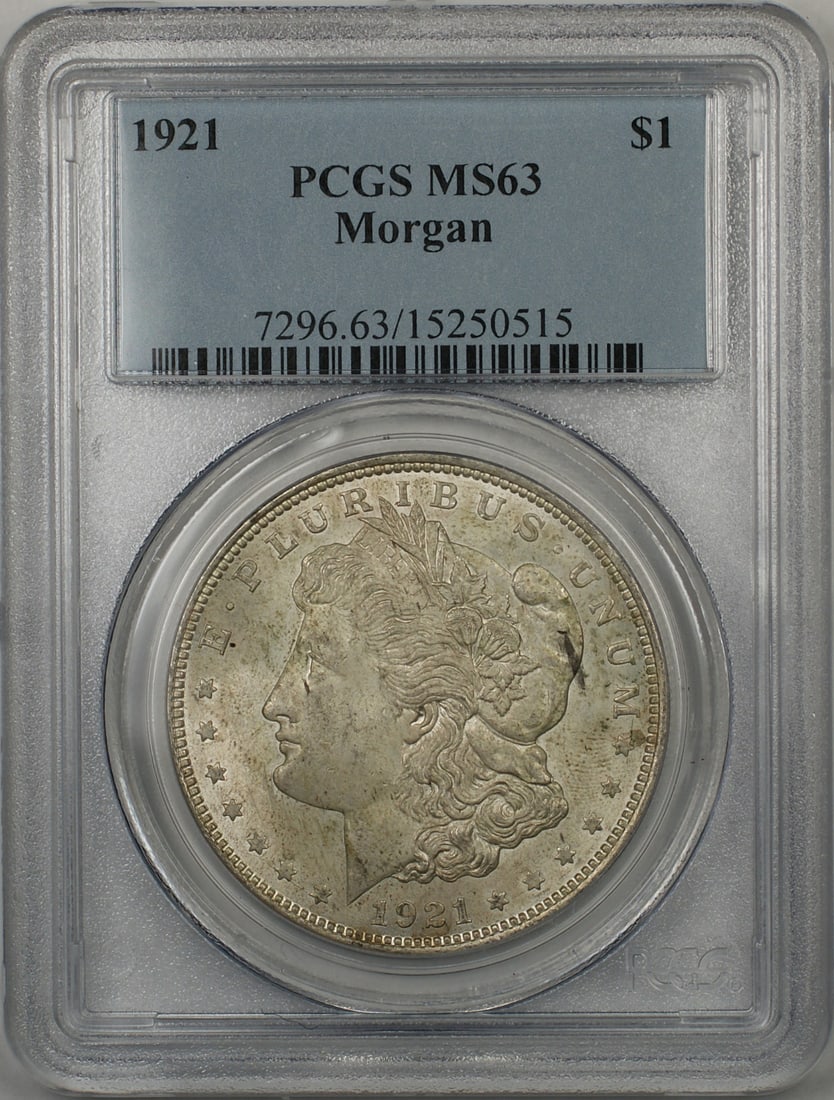 1921 Silver Morgan Dollar Philadelphia PCGS MS-63 with Toning: 1921 Silver Morgan Dollar Philadelphia PCGS MS-63 with Toning This 1921 Morgan Silver Dollar $1 coin was minted in Philadelphia and is composed of silver. Certified by PCGS with a grade of MS-63, it f