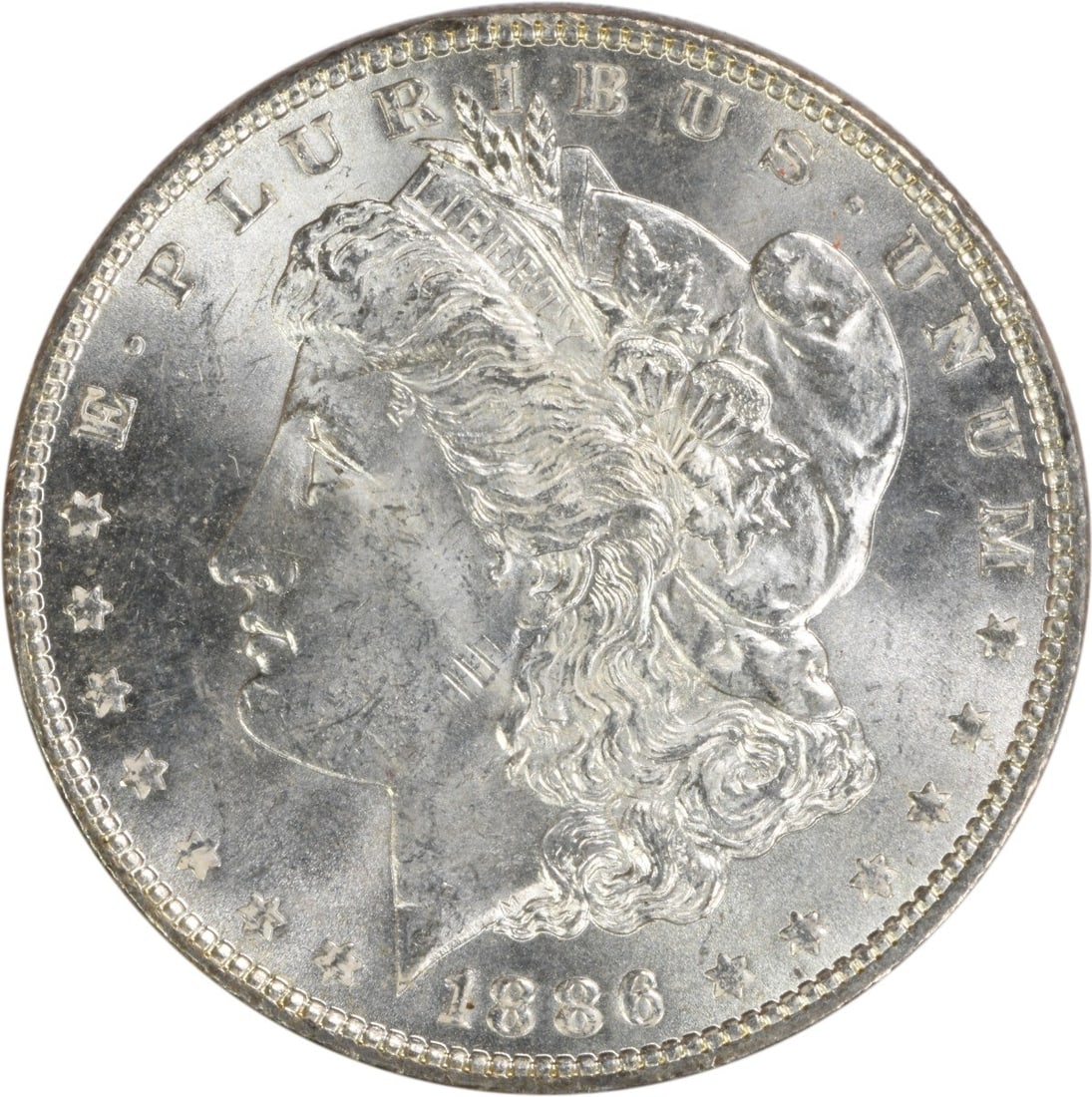 Uncirculated 1886 Silver Dollar Morgan BU Philadelphia No Mint Mark: Uncirculated 1886 Silver Dollar Morgan BU Philadelphia No Mint Mark This 1886 Morgan Silver Dollar features an uncirculated, brilliant uncirculated (BU) grade. It is composed of silver and was minted 