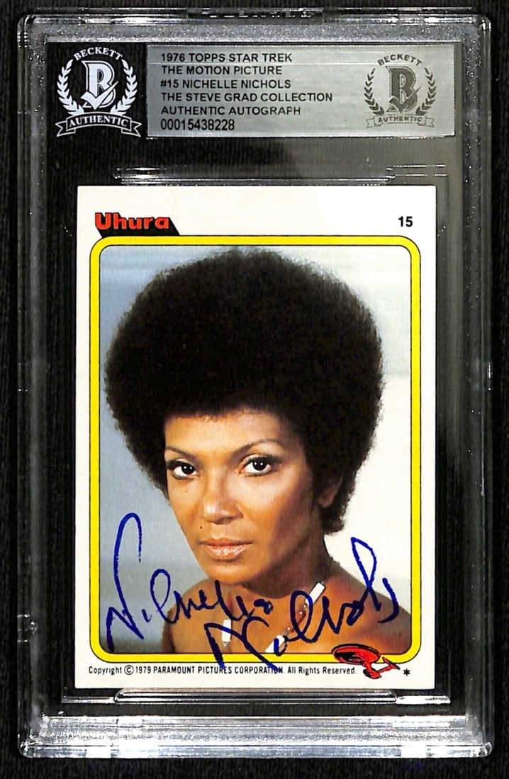 Nichelle Nichols Uhura Signed 1979 Topps Star Trek Card Beckett Authenticated: Nichelle Nichols Uhura Signed 1979 Topps Star Trek Card Beckett Authenticated This is an autographed 1979 Topps Star Trek The Motion Picture #15 trading card featuring Nichelle Nichols, who portrayed 