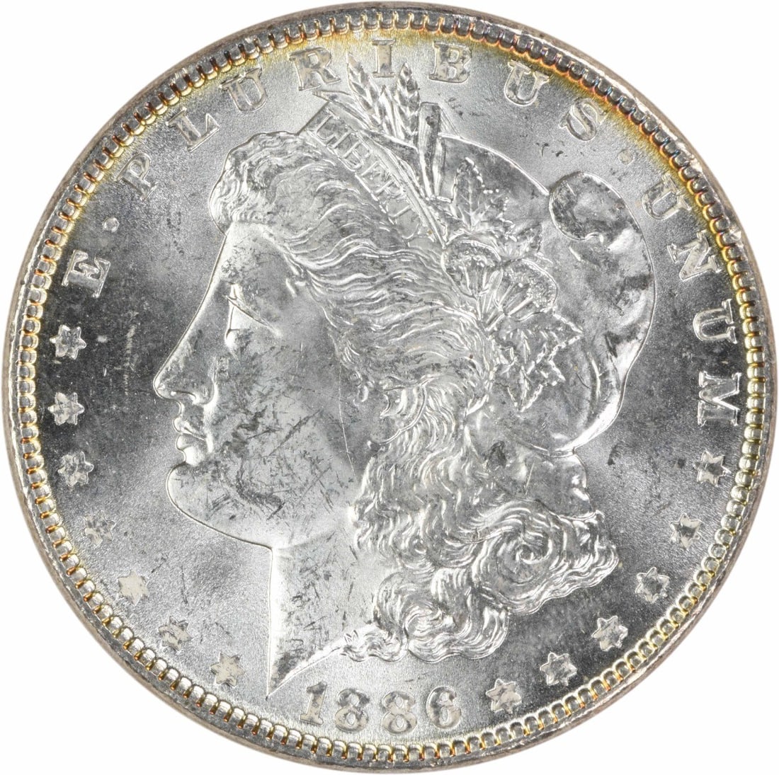 1886 Uncirculated Morgan Silver Dollar $1 Uncertified: 1886 Uncirculated Morgan Silver Dollar $1 Uncertified An 1886 Morgan Silver Dollar in uncirculated condition, certified as uncertified and graded MS60. Struck in the United States, this $1 coin is com