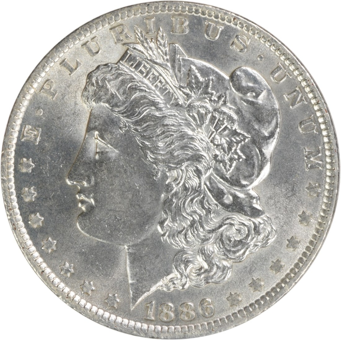 Uncirculated 1886 Morgan Silver Dollar Brilliant Uncirculated No Mint Mark: Uncirculated 1886 Morgan Silver Dollar Brilliant Uncirculated No Mint Mark This is an 1886 Morgan Silver Dollar from the United States in Brilliant Uncirculated (BU) condition. The coin is uncertified