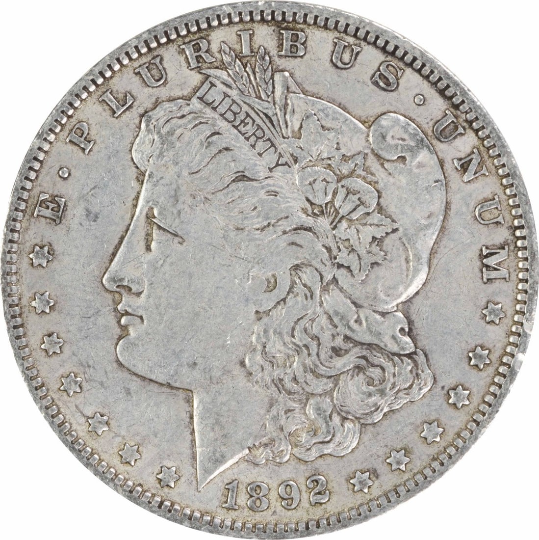 1892 O $1 Morgan Dollar Silver EF Uncertified: 1892 O $1 Morgan Dollar Silver EF Uncertified 1892-O Morgan Silver Dollar in EF grade. This circulated, uncertified coin is a pre-owned example of the classic Morgan dollar series from the United Stat
