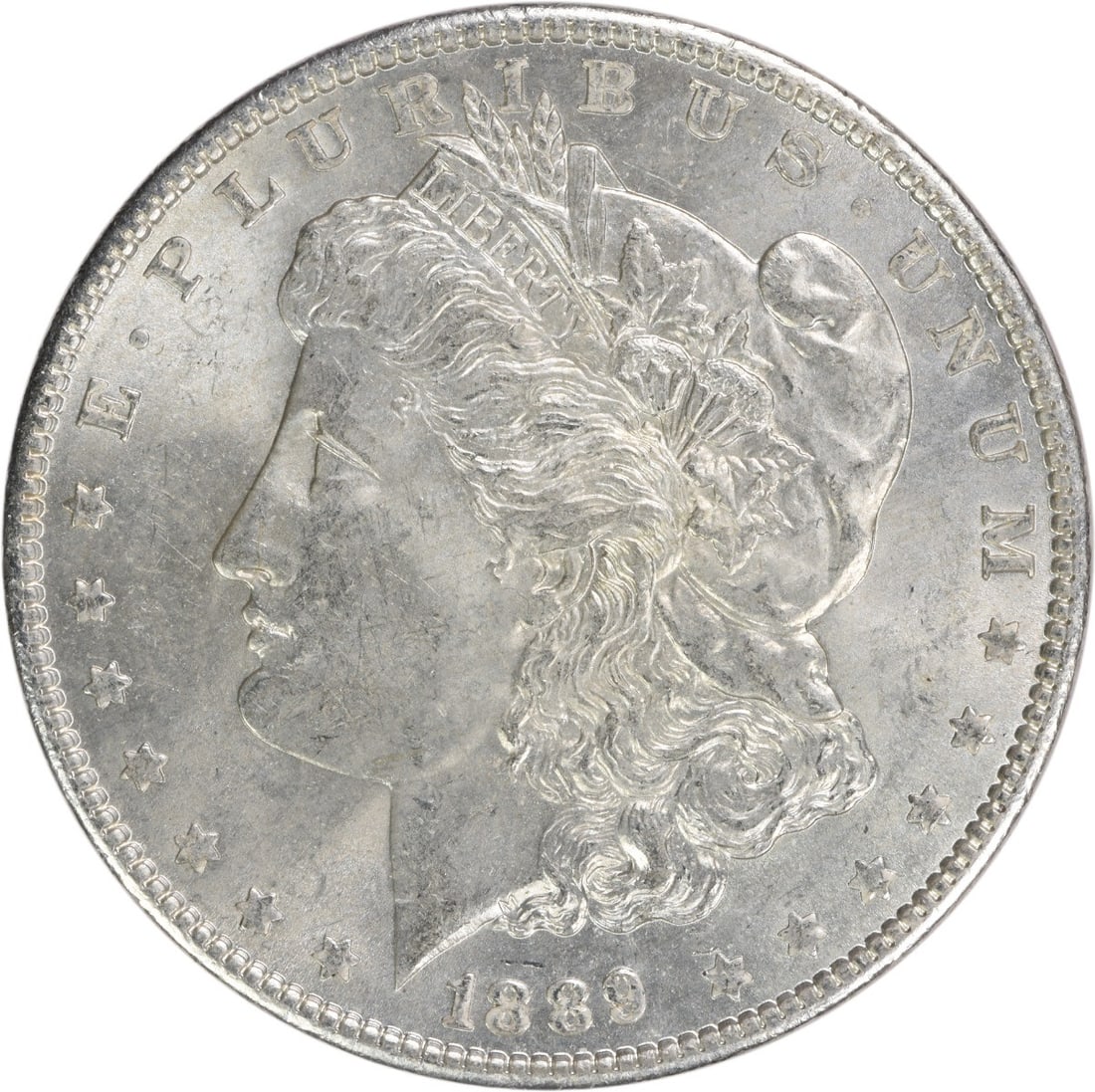 Choice BU 1889 Silver Morgan Dollar Uncirculated Uncertified Coin: Choice BU 1889 Silver Morgan Dollar Uncirculated Uncertified Coin This 1889 Morgan Silver Dollar is a Choice Brilliant Uncirculated (BU) coin. It is uncertified and features no mint mark. The coin is 