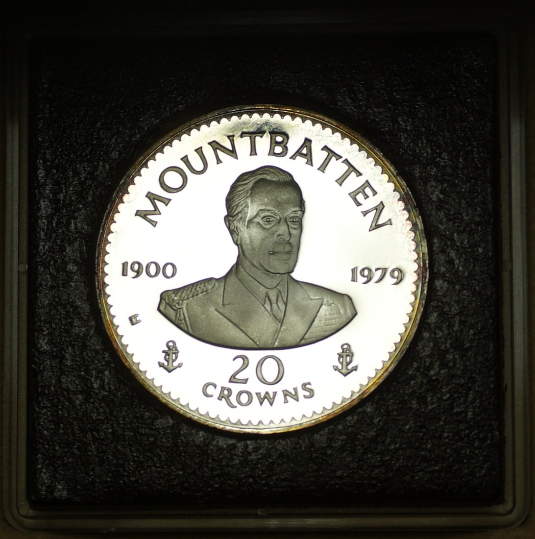 Turks and Caicos 1980 20 Crown Silver Proof Mountbatten Coin OGP: Turks and Caicos 1980 20 Crown Silver Proof Mountbatten Coin OGP 1980 Turks and Caicos 20 Crown silver proof coin commemorating Admiral Louis Mountbatten. The coin shows rim toning on both the obverse