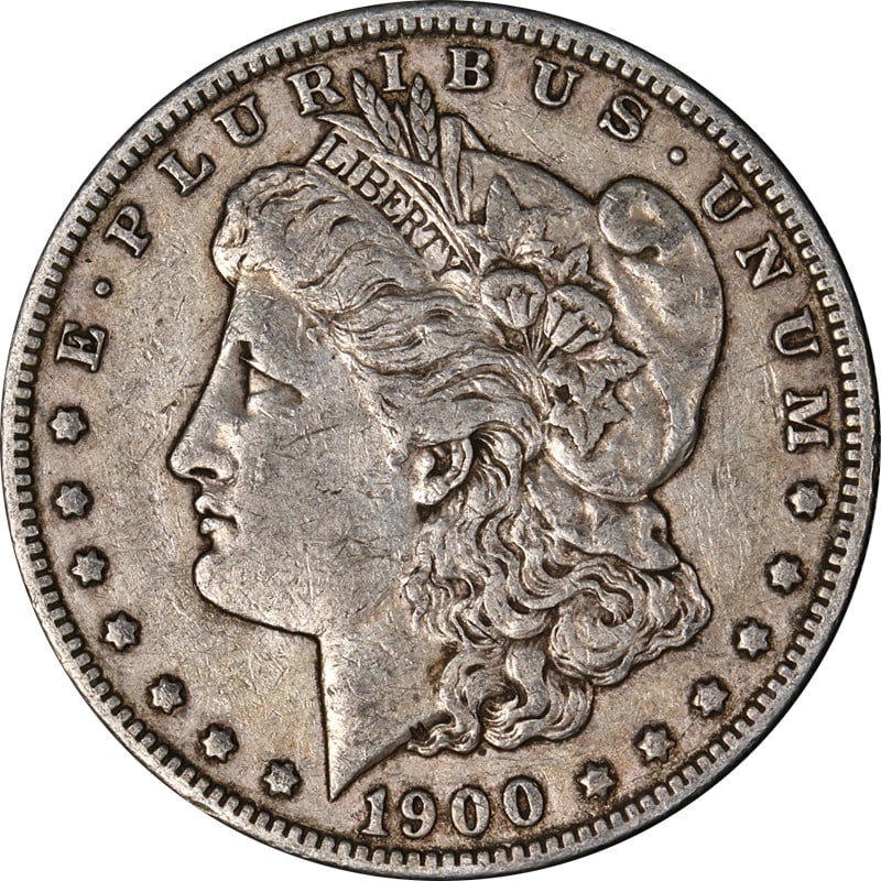 1900 P Morgan silver dollar circulated UNCERTIFIED: 1900 P Morgan silver dollar circulated UNCERTIFIED This 1900-P Morgan Silver Dollar is a circulated coin, selected for its strong eye appeal, attractive color, and clean surfaces. It is composed of 90