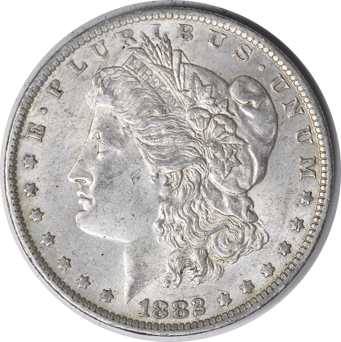 1882-O Morgan Silver Dollar VAM 3 AU Uncertified 90% Silver: 1882-O Morgan Silver Dollar VAM 3 AU Uncertified 90% Silver This 1882-O/S VAM 3 Morgan Silver Dollar is a striking piece from the New Orleans mint, featuring a classic design by George T. Morgan. The 