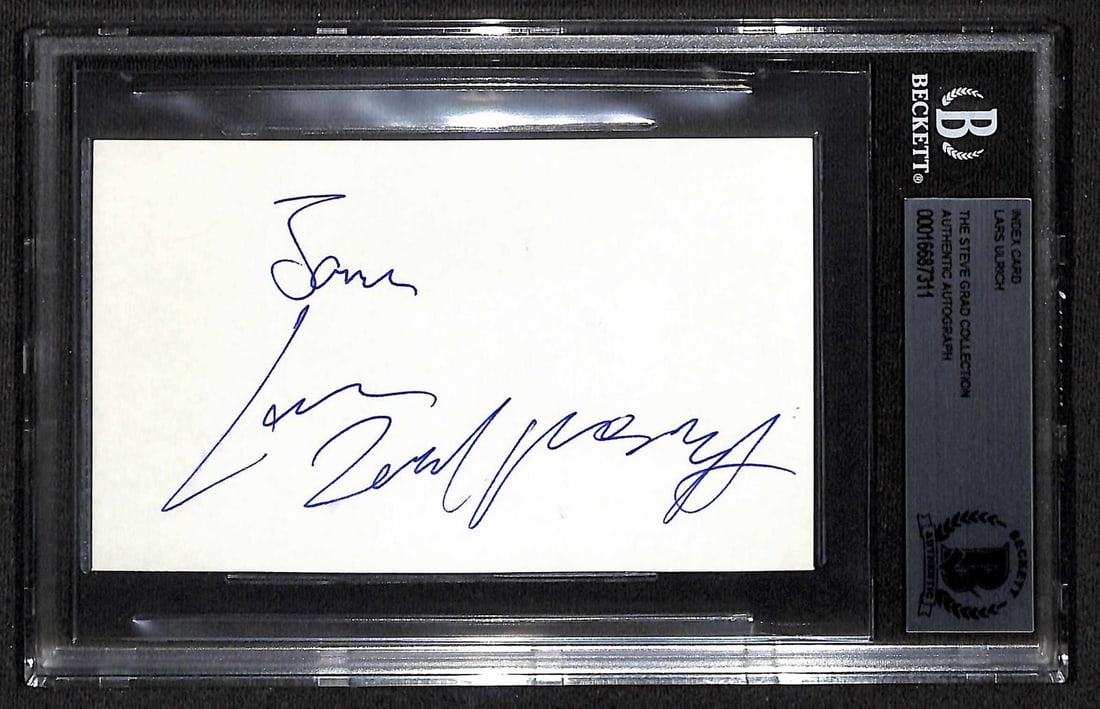 Beckett slabbed Lars Ulrich signed index card: Beckett slabbed Lars Ulrich signed index card This is a signed index card featuring the authentic autograph of Lars Ulrich, the renowned drummer and co-founder of Metallica. The autograph is presented