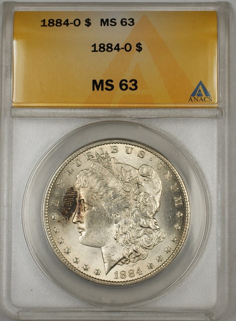 ANACS MS63 1884-O Silver Morgan Dollar Uncirculated New Orleans Mint: ANACS MS63 1884-O Silver Morgan Dollar Uncirculated New Orleans Mint This 1884-O Morgan Silver Dollar is an uncirculated $1 coin graded MS-63 by ANACS. Minted in New Orleans in 1884, it is composed of