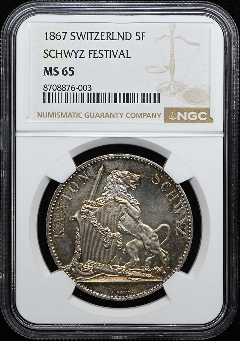 Switzerland 1867 Schwyz Festival 5 Francs NGC MS65 Martin-616 R-1070a: Switzerland 1867 Schwyz Festival 5 Francs NGC MS65 Martin-616 R-1070a 1867 Switzerland Schwyz Festival 5F coin certified by NGC and graded MS65. This pre-owned example is listed as uncirculated. Speci