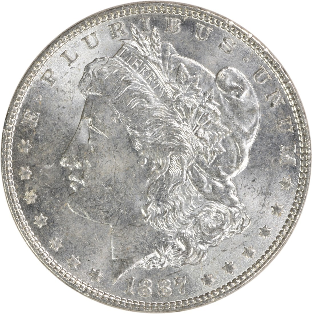 Brilliant Uncirculated 1887 Silver Morgan Dollar Uncertified Philadelphia Mint: Brilliant Uncirculated 1887 Silver Morgan Dollar Uncertified Philadelphia Mint This is an 1887 Morgan Silver Dollar from the United States. The coin is composed of silver, has a denomination of $1, an
