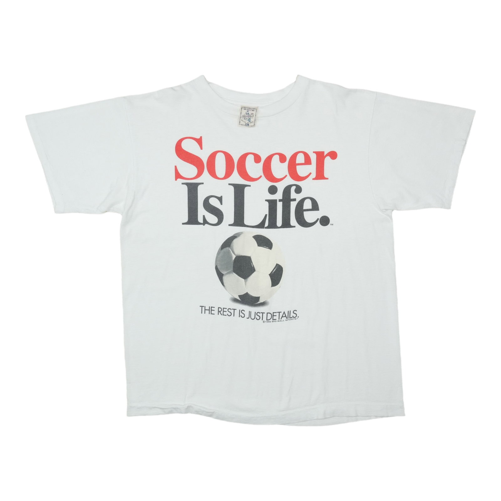 Vintage 1992 Soccer Is Life White Cotton T Shirt XL: Vintage 1992 Soccer Is Life White Cotton T Shirt XL Original vintage 1992 Soccer Is Life shirt. This is a true vintage shirt, not a modern reproduction. It is in excellent condition with no holes or s