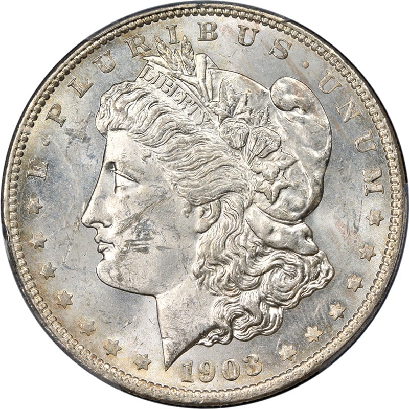 1903-O Morgan Silver Dollar PCGS MS61 Uncirculated Silver Coin: 1903-O Morgan Silver Dollar PCGS MS61 Uncirculated Silver Coin This stunning 1903-O Morgan Silver Dollar showcases bright white surfaces with nice luster and a strong strike, making it a great additio