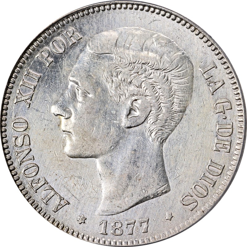 1877 Spain 5 Pesetas Silver Coin ICG AU58 Details KM#676: 1877 Spain 5 Pesetas Silver Coin ICG AU58 Details KM#676 Spain 1877 DEM Five (5) Pesetas coin certified by ICG with AU58 Details grading. It is a circulated silver coin from Spain, identified as KM#67