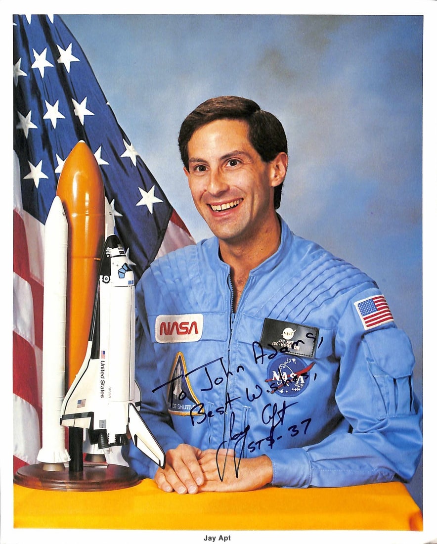 Jay Apt Signed NASA 8x10 Photo STS-37 BECKETT Authenticated: Jay Apt Signed NASA 8x10 Photo STS-37 BECKETT Authenticated Offered is a signed 8x10 NASA portrait of astronaut Jay Apt, featured in his blue NASA flight suit beside a model of the Space Shuttle. Apt 