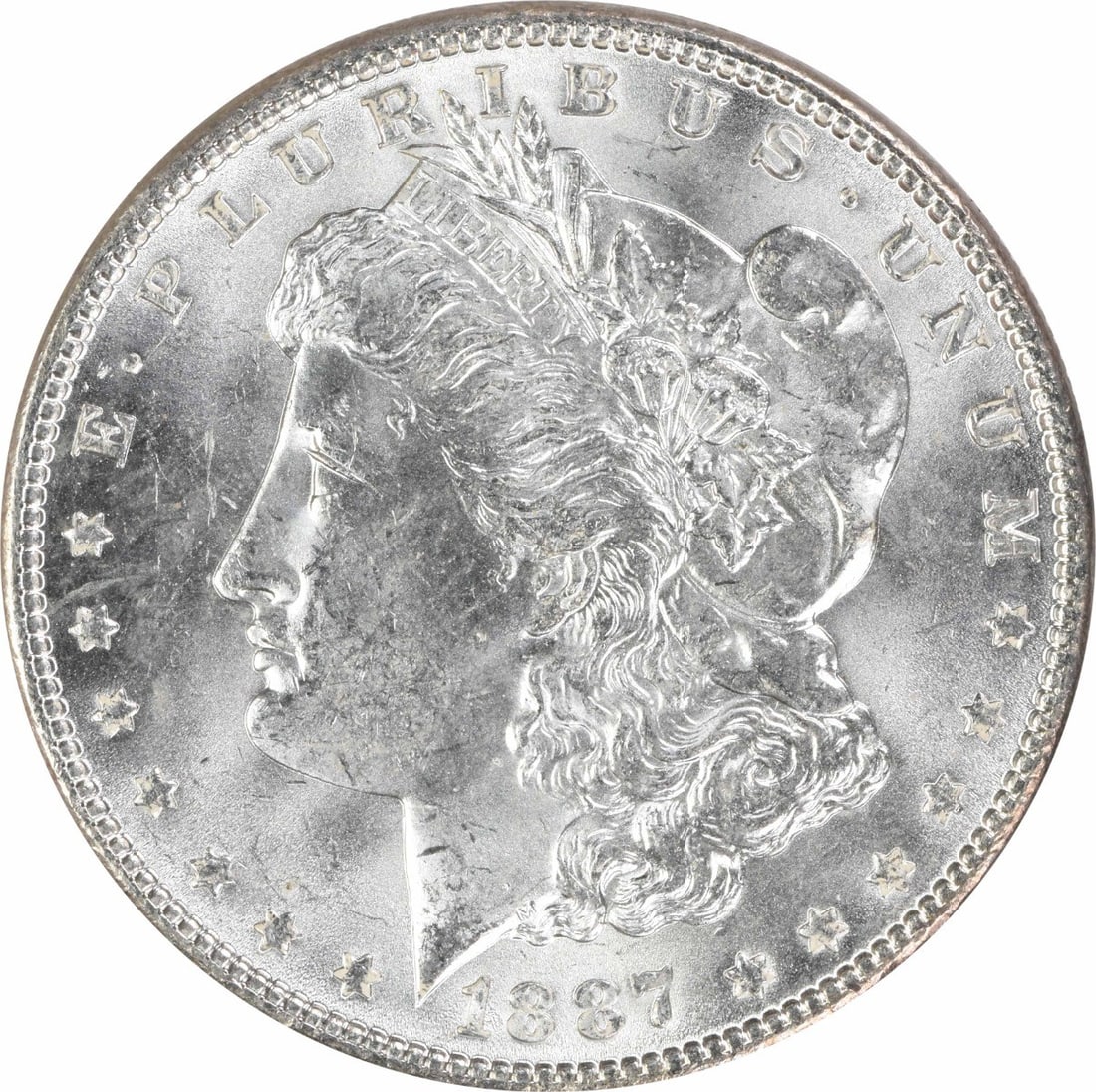 1887 Uncertified Morgan Silver Dollar $1 Uncirculated: 1887 Uncertified Morgan Silver Dollar $1 Uncirculated 1887 Morgan Silver Dollar in uncirculated, pre-owned condition. This uncertified silver $1 coin is identified as a Choice BU example and listed wi
