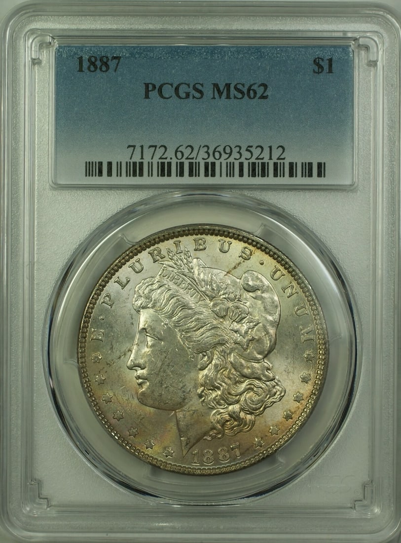 PCGS MS62 1887 Morgan Dollar Silver Coin Toned Reverse Philadelphia Mint: PCGS MS62 1887 Morgan Dollar Silver Coin Toned Reverse Philadelphia Mint This is an 1887 Morgan Silver Dollar $1 coin, certified by PCGS with a grade of MS-62. The coin is uncirculated and features a 