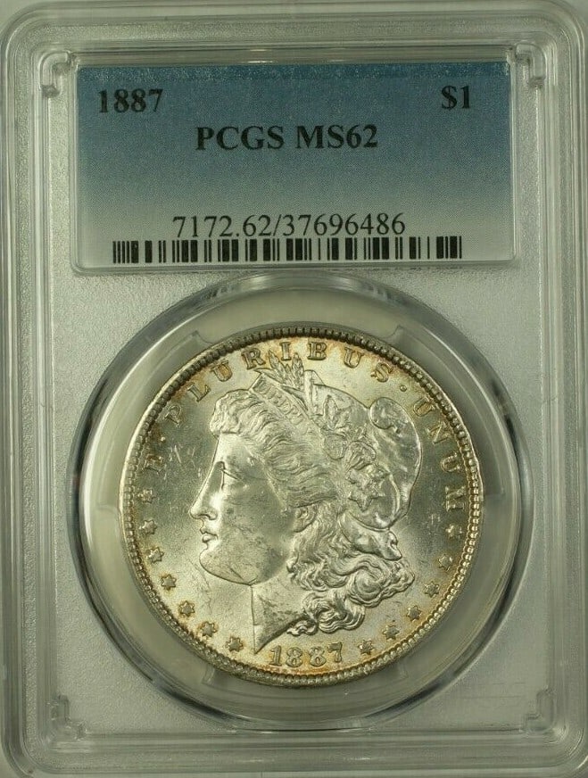 PCGS MS62 1887 Morgan Dollar Light Toning: PCGS MS62 1887 Morgan Dollar Light Toning This 1887 Morgan Silver Dollar is graded MS-62 by PCGS, indicating an uncirculated condition with light toning. Struck at the Philadelphia Mint, this collecti
