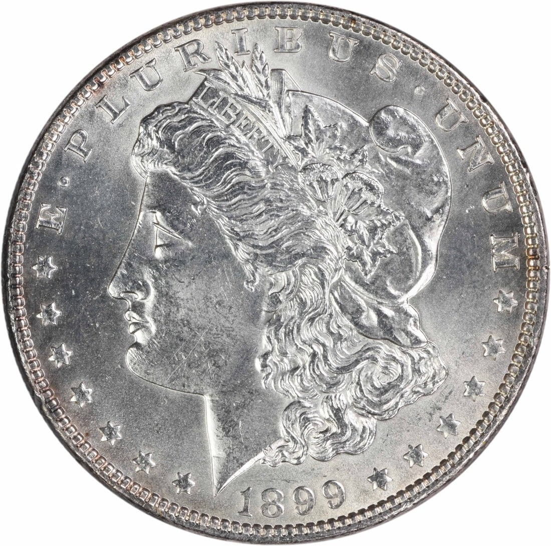 Uncirculated 1899 Silver Dollar Morgan Choice BU Uncertified: Uncirculated 1899 Silver Dollar Morgan Choice BU Uncertified This is an uncirculated 1899 Morgan Silver Dollar graded as Choice BU. The coin is uncertified and features no mint mark. It is composed of