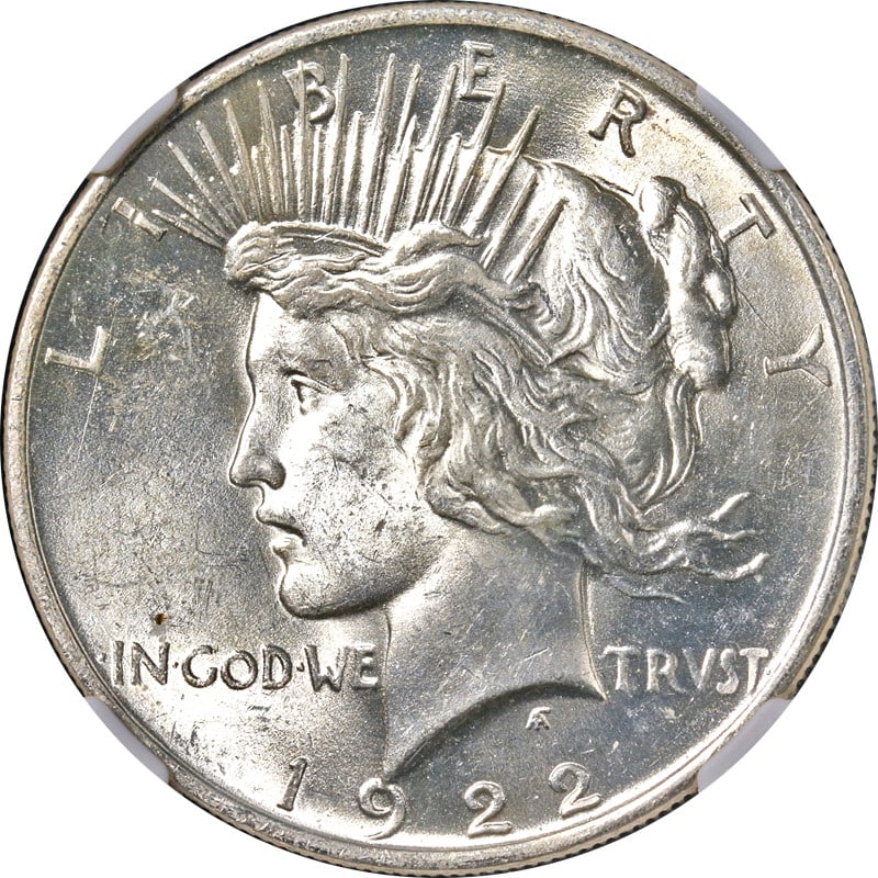 1922-P Peace Dollar NGC MS63 Uncirculated Bright White Coin: 1922-P Peace Dollar NGC MS63 Uncirculated Bright White Coin This 1922-P Peace Dollar is certified by NGC with a grade of MS63, showcasing impressive eye appeal and a bright white finish. The coin is u