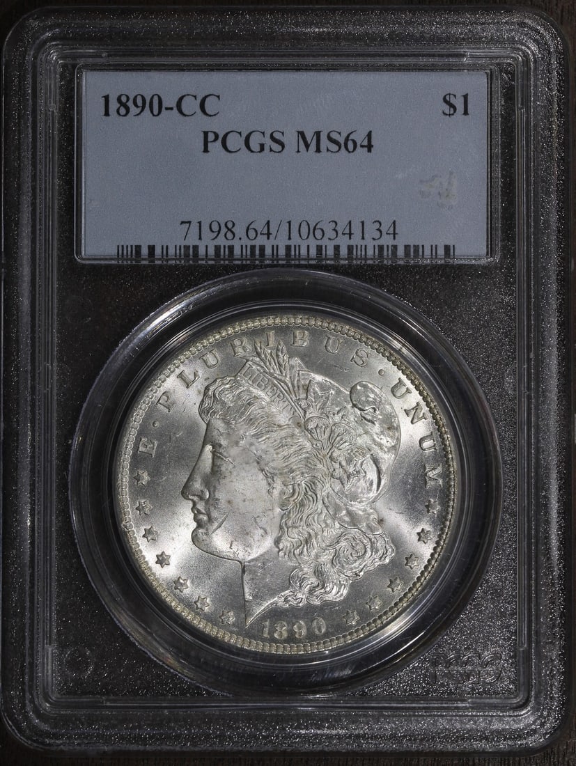PCGS MS64 1890 CC Morgan Silver Dollar Carson City $1: PCGS MS64 1890 CC Morgan Silver Dollar Carson City $1 1890-CC Morgan Silver Dollar graded MS64 by PCGS. This pre-owned United States $1 coin is struck in 0.9 fine silver and features the Carson City v