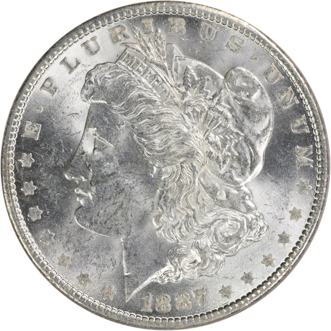 Uncirculated 1887 Silver Dollar Morgan BU No Mint Mark Uncertified: Uncirculated 1887 Silver Dollar Morgan BU No Mint Mark Uncertified This is an 1887 Morgan Silver Dollar from the United States, featuring a brilliant uncirculated (BU) condition. The coin is composed 