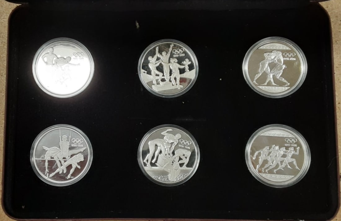 10 Coin 1996 Olympic Centennial Silver Set Five Nations With Original Case: 10 Coin 1996 Olympic Centennial Silver Set Five Nations With Original Case This 1996 Olympic Centennial 10-piece coin set includes two .925 silver commemorative coins from each of the following countr