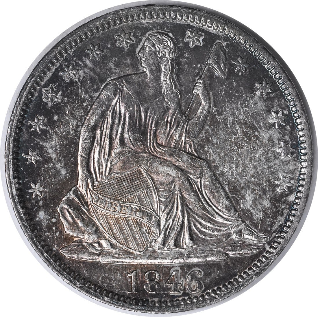 1846 Liberty Seated Half Dollar 50C Tall Date 90% Silver Uncertified: 1846 Liberty Seated Half Dollar 50C Tall Date 90% Silver Uncertified This 1846 Liberty Seated Half Dollar features a tall date and is graded as AU. It was minted in Philadelphia and showcases the clas