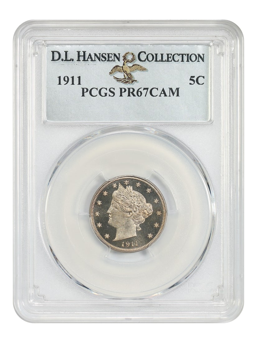 Liberty Nickel 1911 5C PCGS PR67CAM ex D.L. Hansen: Liberty Nickel 1911 5C PCGS PR67CAM ex D.L. Hansen 1911 Liberty Nickel certified by PCGS as PR67CAM and pedigreed ex: D.L. Hansen. Creamy silver surfaces show light streaks of orange toning on both si