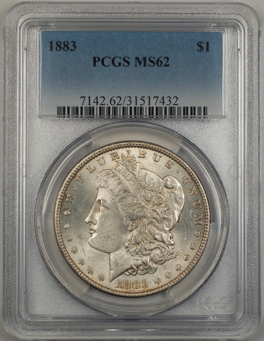 PCGS MS62 1883 Morgan Silver Dollar with Light Toning: PCGS MS62 1883 Morgan Silver Dollar with Light Toning This 1883 Morgan Silver Dollar is certified by PCGS with a grade of MS62. Struck in Philadelphia, the coin features light toning and remains uncir